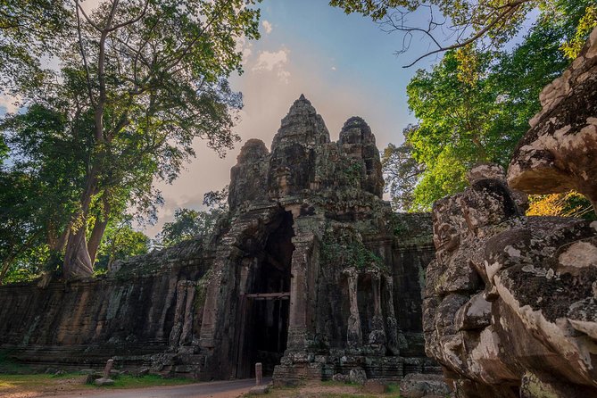1-Day Amazing Angkor Wat Tour with Sunset & All Interesting Major Temples - Angkor Thom and Bayon’s stone faces