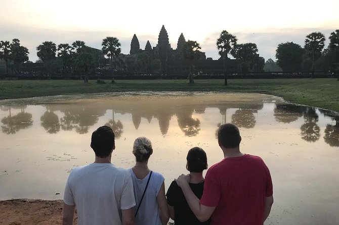 2-D Angkor temple tour with one sunrise in A/C vehicle and guide. - Day one: Ta Prohm, Pre Rup, and the outer temples
