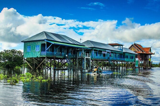 2-Day Angkor Wat, Banteay Srei & Floating Village Kampong Pluk - Angkor Thom moves from gates to smiling faces