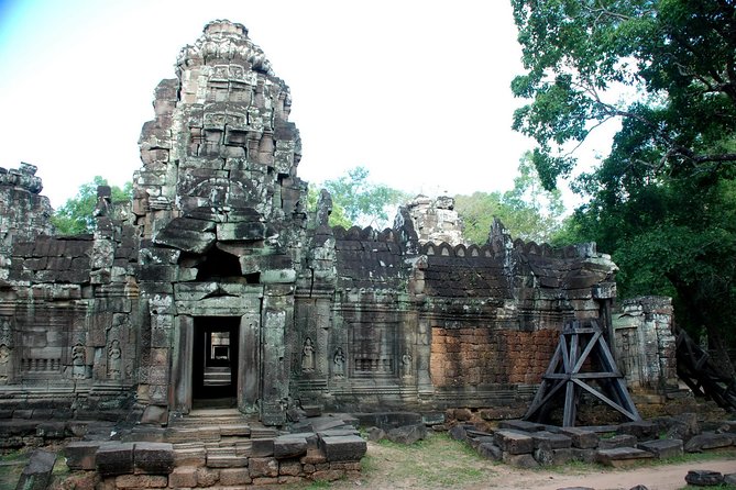 2-Day Angkor Wat & Tonle Sap Tour - Day one: Bayon faces, jungle roots, and Angkor Wat