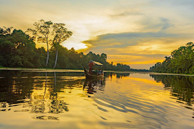 Angkor Bike & Gondola Ride at Twilight - Crossing rice fields on the way to Angkor Thom
