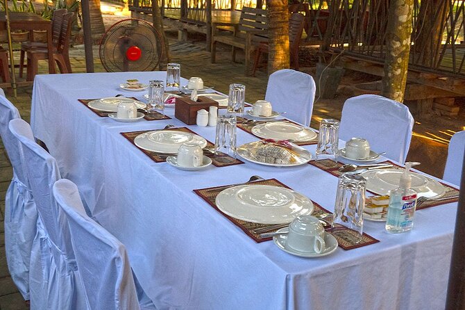 Angkor Sunrise Bike Tour - Breakfast & Lunch included - Bayon’s stone faces and daily life