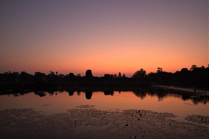 Angkor Sunrise Expedition Cycling Through Serene Backroads - Along the wall of Angkor Thom
