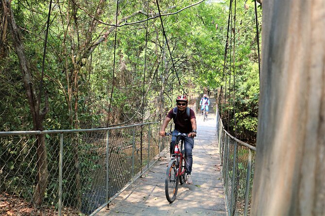 Angkor Sunrise Expedition Cycling Through Serene Backroads - The faces of Bayon