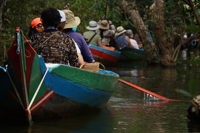 Angkor Sunrise & Floating Village Sunset Full-Day Siem Reap Tour - Ta Prohm and its stone roots