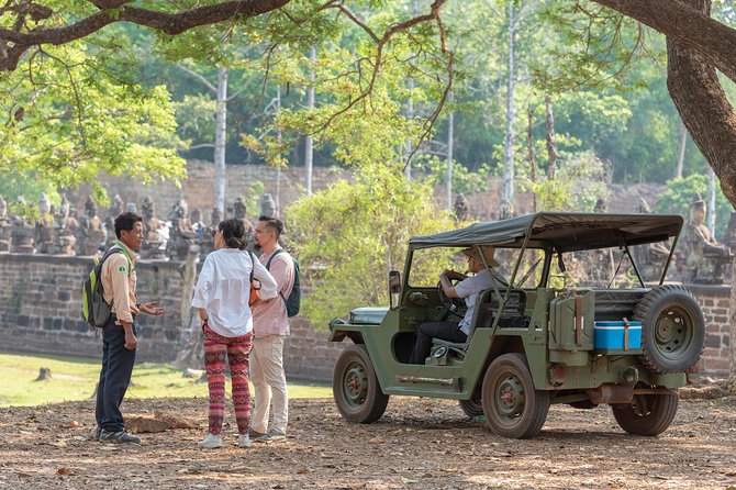 Angkor Wat by Vintage Jeep – Private Tour - Angkor Thom and the smiling faces of Bayon