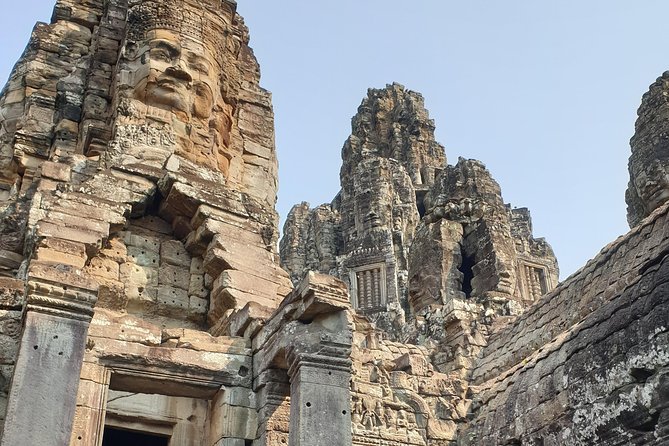 Angkor Wat Full Day Tour in Siem Reap Small-Group - Bayon and its maze of smiling faces