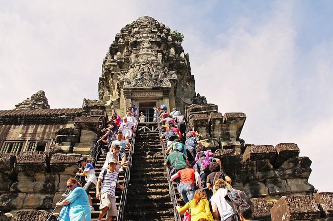 Angkor Wat Private Day Tour from Siem Reap - Angkor Thom’s South Gate and the road into the royal city
