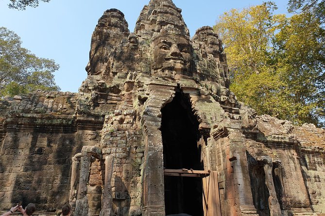 Angkor Wat Sunrise Private Full Day Tour - Bayon Temple: close-up faces and compact corridors