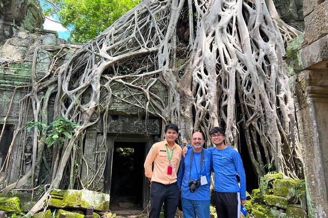 Angkor Wat Sunrise Tour By E-Bike Experience With Breakfast Included - Ta Prohm and the drama of roots over stone