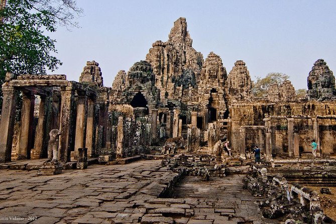 Angkor Wat Sunset Tour - Bayon’s stone faces are the day’s visual surprise