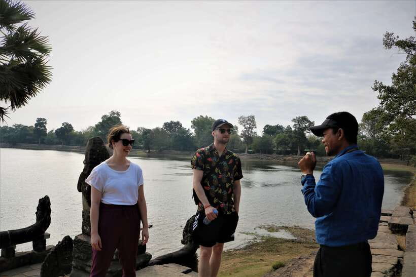 Angkor Wat: Tuk Tuk and Walking Tour - Walking through Angkor Thom and its old defenses