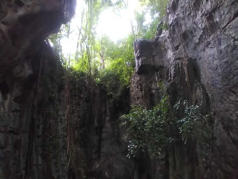 Bamboo train. Phnom Sampove cave. Bat cave and Banan Temple - The bat cave at sunset