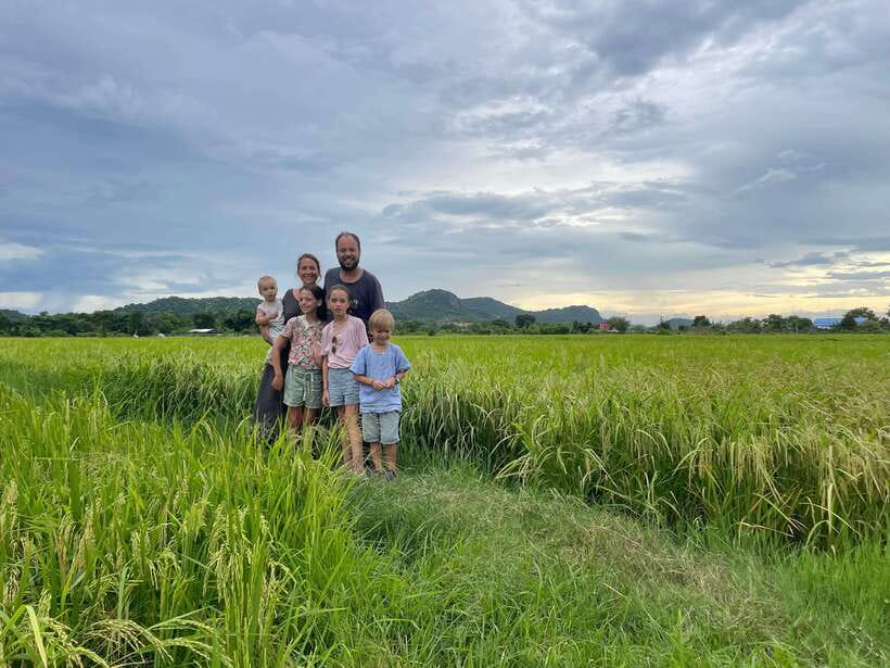 Battambang: Bamboo Train, Bat Cave and Killing Cave Tour - Crossing the suspension bridge