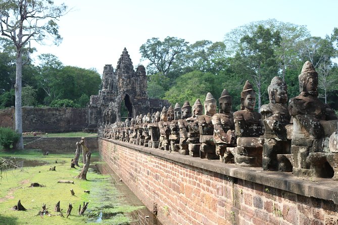 Classic Angkor Wat Sunrise or Sunset Private and Small GroupTour - Bayon and the monumental gates of Angkor Thom
