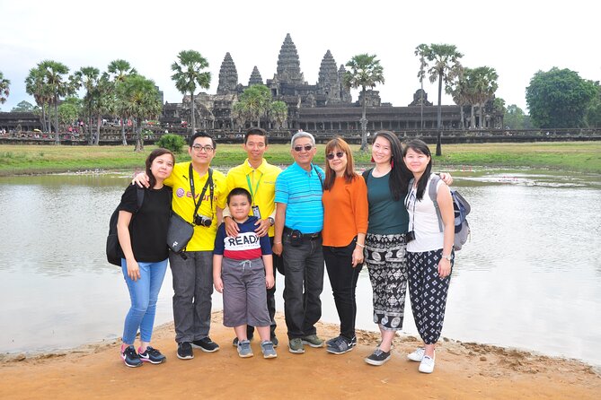 Classic Angkor Wat Sunrise or Sunset Private and Small GroupTour - Ta Prohm: tree roots and weathered stone