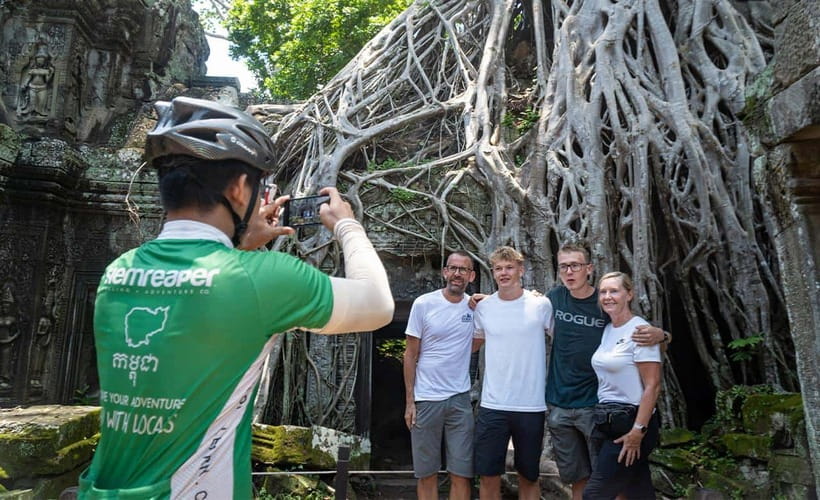 Cycle Angkor Backroad Bike Tour / E-Bike or Tuk Tuk - Bayon’s stone faces and central towers