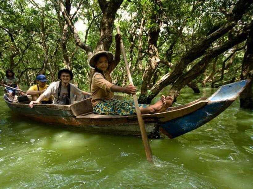 Floating Village-Mangroves Forest Tonle Sap Lake Boat Tour - Stilted homes and the changing waters of Tonle Sap
