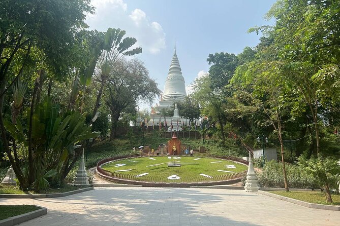 Guided Phnom Penh Heritage Tour - A modern hotel, a historic villa, and student art