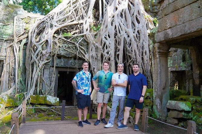 Half Day Tour- Angkor Wat, Ta Promh, Bayon Temple - Ta Prohm beneath the trees