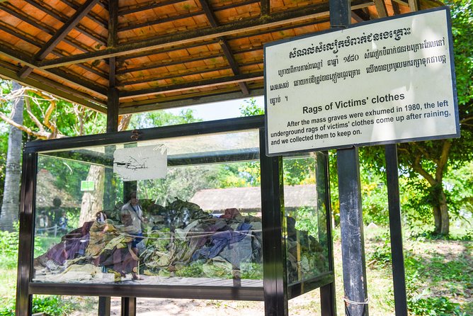 Killing Fields and Prison S21 Bus Tour - Walking through Choeung Ek