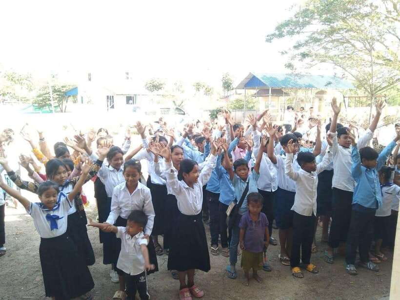 Kompong Khleang Floating Village: Full-Day from Siem Reap - Giving supplies at the local school
