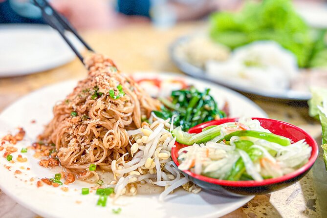 Old Siem Reap Sunset Food Tour by Tuk-tuk - Yi Nget’s barbecue beef sticks