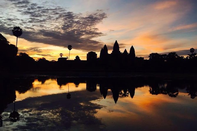 One Day tour with sunrise in car with A/C or Van & Guide. - Bayon and the great city of Angkor Thom
