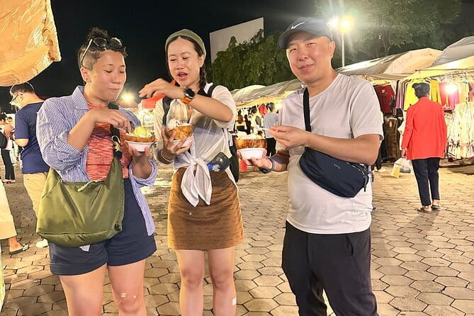 Phnom Penh Night City Highlights & Local Food tour by Tuktuk - Cambodian sweets at Russian Market