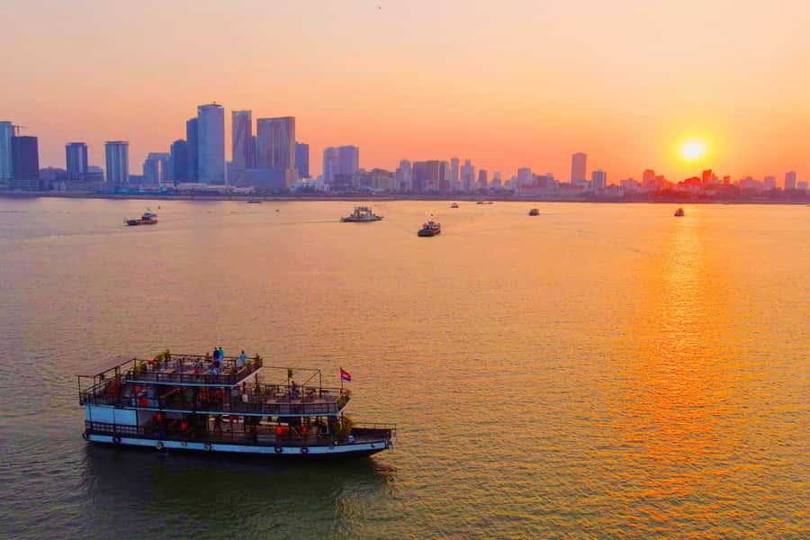 Phnom Penh: Sunset Cruise with Unlimited Beer &Fruit platter - Settling aboard the 90-minute cruise