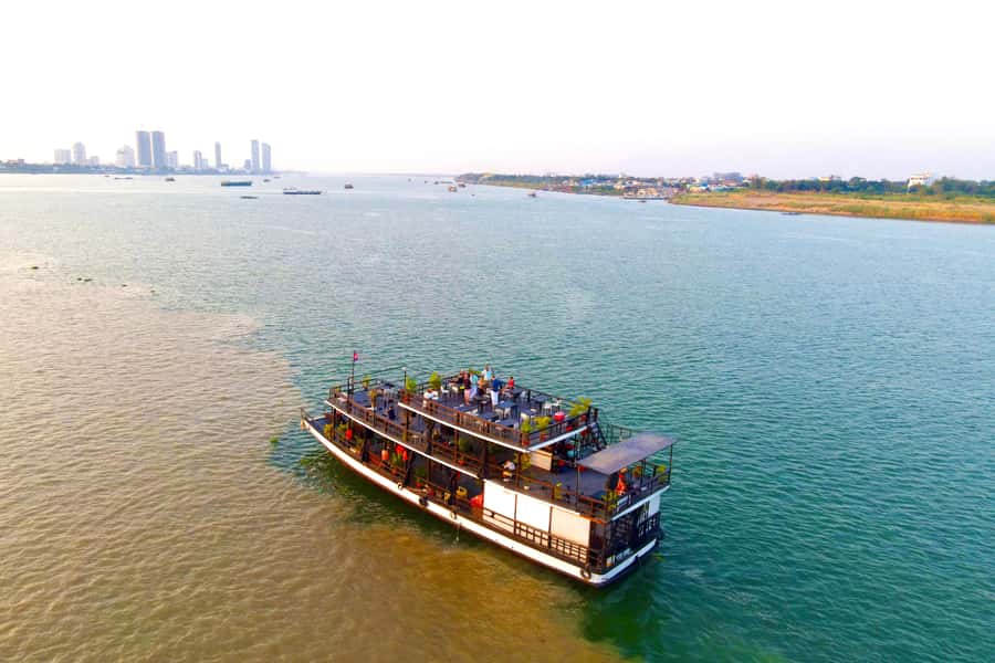 Phnom Penh: Sunset Cruise with Unlimited Beer &Fruit platter - Sunset, fruit, and music on the return