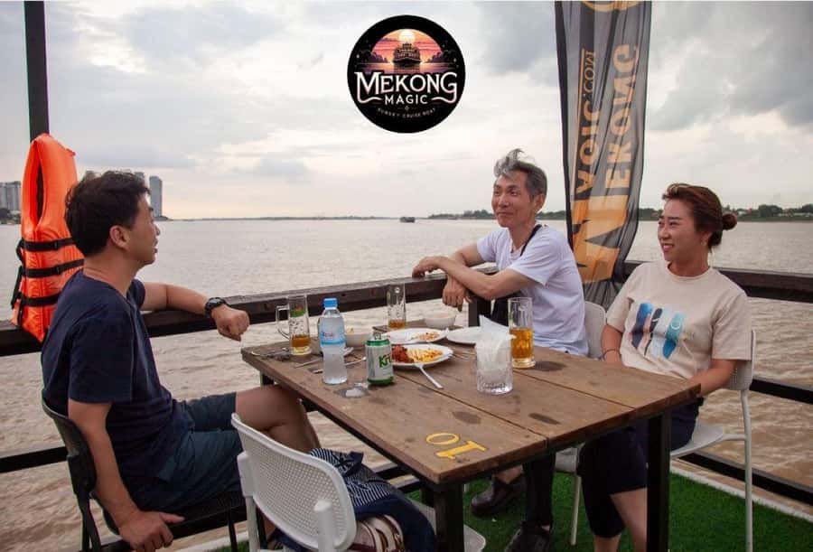 Phnom Penh: Sunset Cruise with Unlimited Beers & BBQ Buffet - A slow route past Phnom Penh’s working riverfront