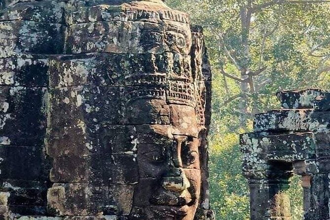 Private guided Full -day Angkor tour with sun set - Angkor Thom and Bayon deliver the big civic scale
