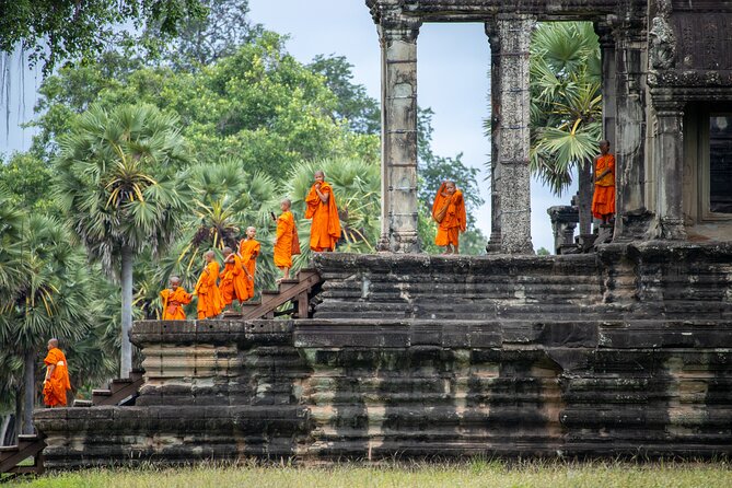 Private Guided Tour To Angkor Wat & Its Surrounding-Angkor Park - Bayon’s stone faces deserve careful timing