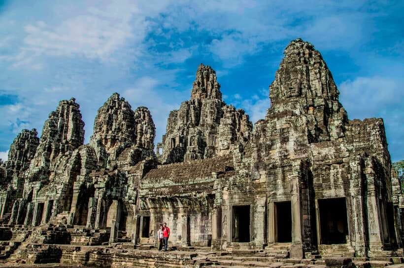 Seat-In-Coach: Small Circuit tour with Sunrise at Angkor Wat - Ta Prohm, trees over stone