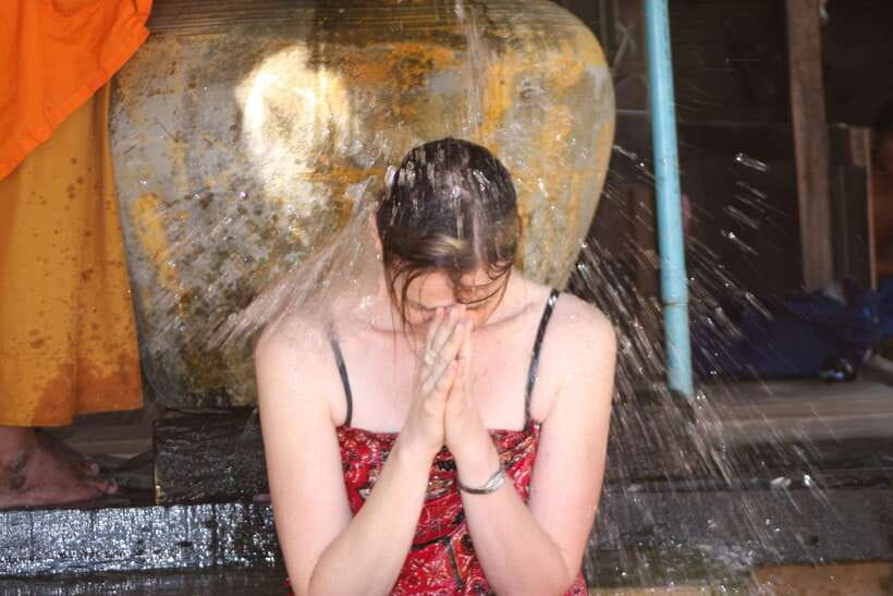 Siem Reap: 1-Hour Cambodian Buddhist Water Blessing - The chanting, water, and red wrist ties