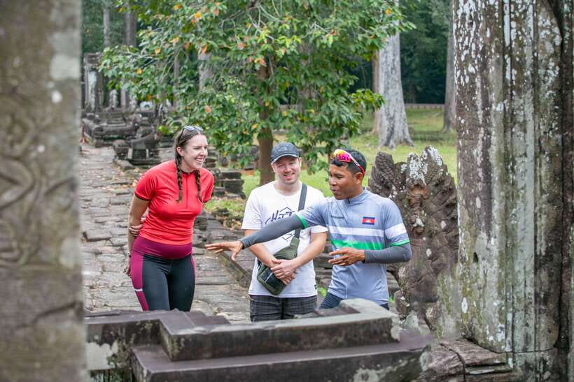 Siem Reap: Angkor Sunrise 2 Days Guided Bike Tour - Sunrise at Angkor Wat, then into the trees
