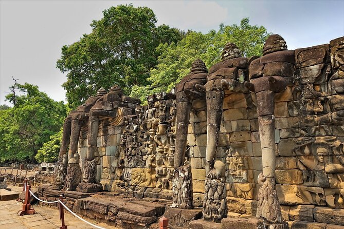 Siem Reap: Angkor Wat Sunrise Bike Tour & Jungle Breakfast - Ta Prohm is atmospheric, but expect a busy famous site