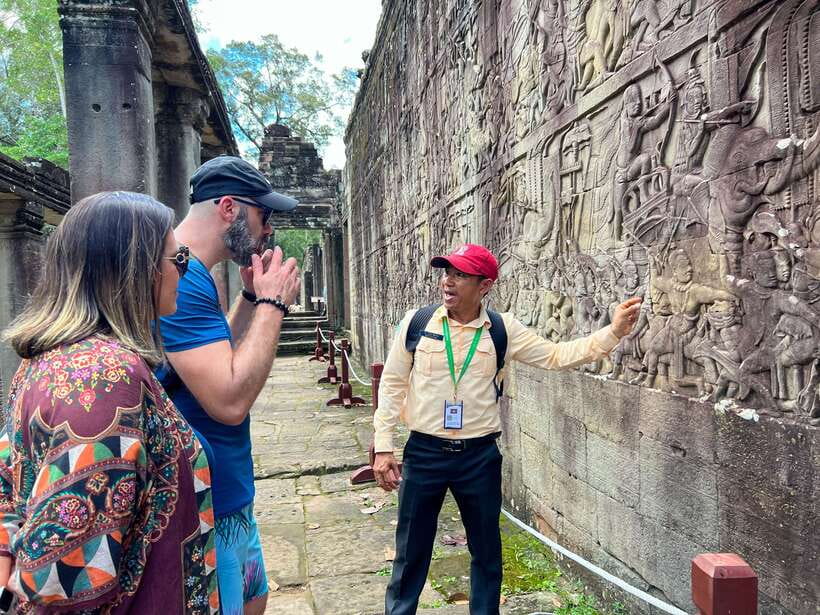 Siem Reap: Angkor Wat Sunrise Tour via Tuk Tuk & Breakfast - Bayon’s stone faces and Angkor Thom’s Victory Gate