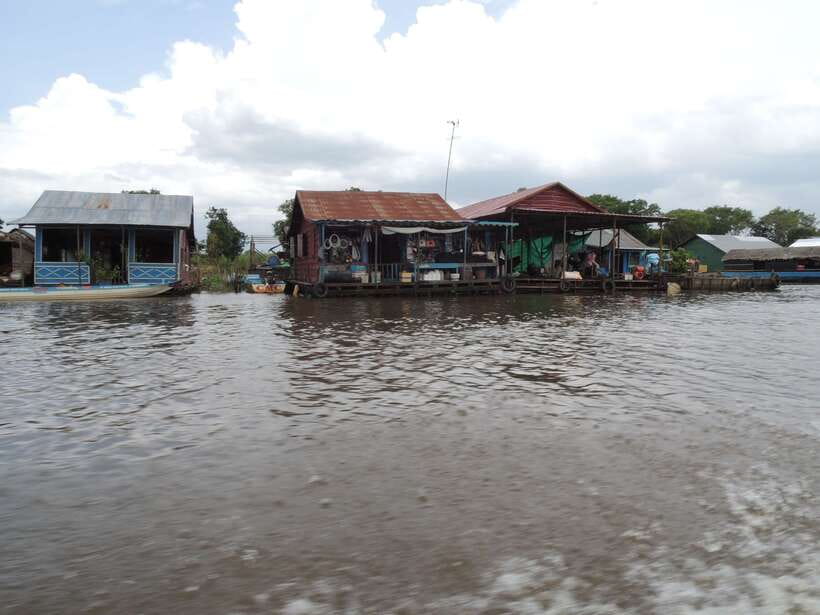 Siem Reap: Floating Village Half-Day Tour - Boarding the boat into the floating village