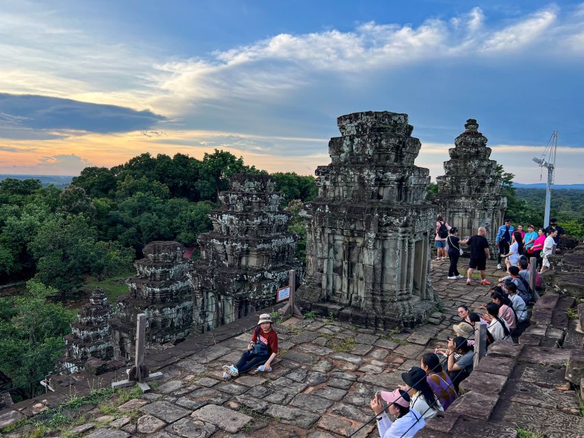 Siem Reap: Full Day Angkor Wat Temple Experience with Sunset - Ta Prohm trades stone walls for tree roots