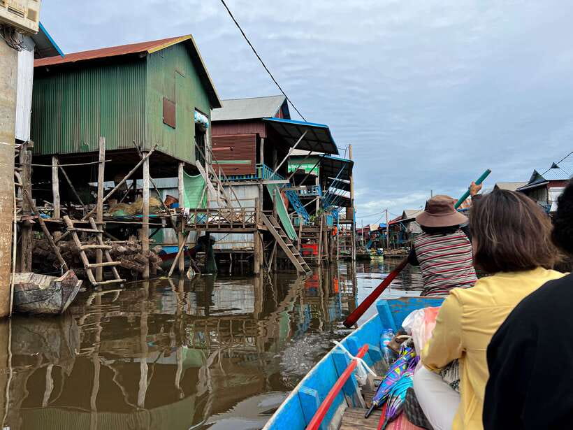 Siem Reap: Kampong Phluk and Tonle Sap Sunset Boat Cruise - Sunset on Tonle Sap, with a weather warning