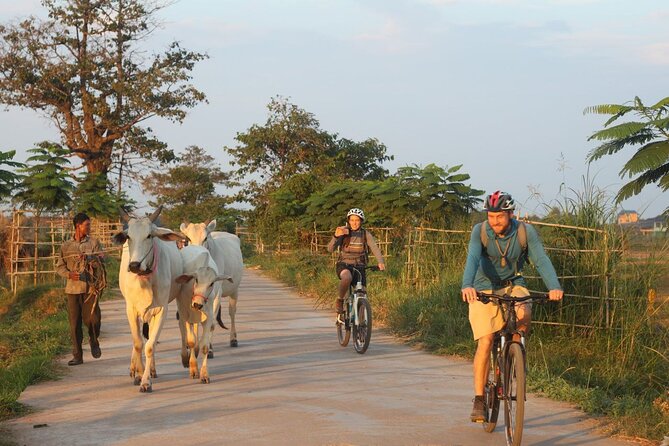 Silk Island at Twilight Cycle Encounter - Leaving Phnom Penh by Ferry at 2pm