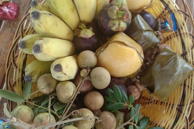 Silk Island Cycling Adventure & lunch with locals - Snacks, a floating lunch, and the final ride