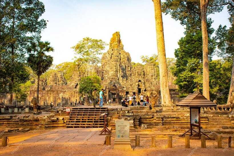 Sunrise at Angkor Wat and Small Tour with Tours Guide - South Gate and the stone faces of Angkor Thom