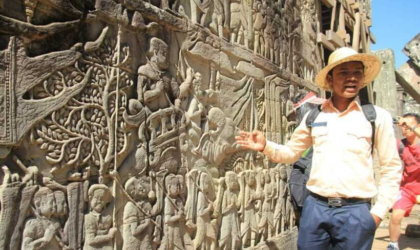 Sunrise at Angkor Wat and Small Tour with Tours Guide - Bayon and Baphoun: faces, towers, and royal power