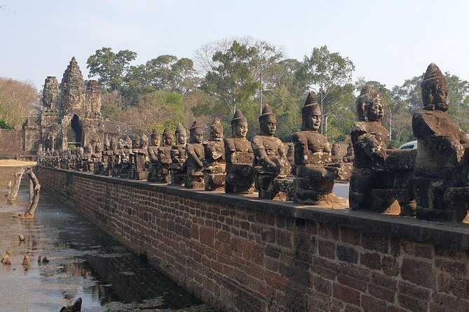 Sunrise Tour of Angkor Temples from Siem Reap - Bayon’s stone faces and maze-like corridors