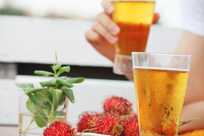 Sunset Cruise with unlimited beer & soft drinks -English speaking guide on board - Sunset, fruit, and an open bar