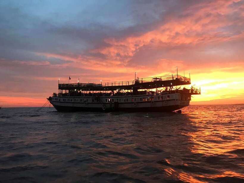 Sunset Dinner Tour: Tonle Sap Lake Floating Village - Lotus fields and the flower behind the photographs