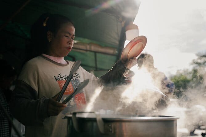 Ultimate Siem Reap Food Tour by Tuk Tuk - 20 Tastings, 8 Stops - Stop 1: Wat Damnak starts the appetite